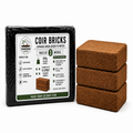 A package of Downwood Coir Bricks next to three stacked brown coir blocks on a white background.